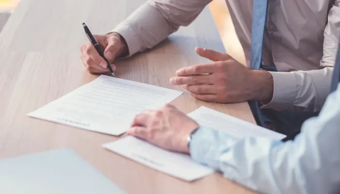 business-people-signing-a-contract-2024-09-12-14-46-00-utc